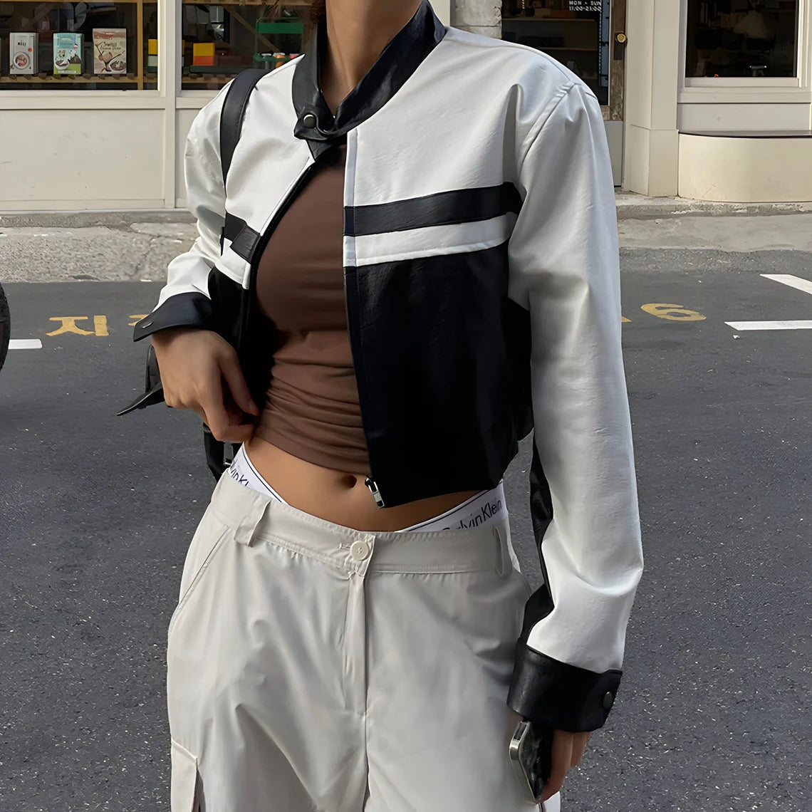 il_1140xN.5071267420_mh0r Stylish cropped leather jacket perfect for motorcycle enthusiasts in France Style