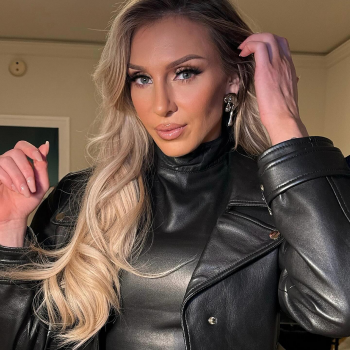 Charlotte Flair TJS leather jacket close-up in France style