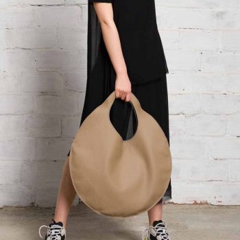 Chic and Elegant Leather Handbag with Circular Design in UK