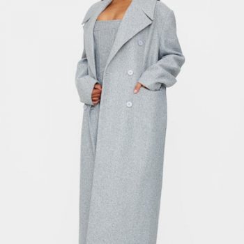 Long oversized grey coat with double breasted front and wool texture in USA