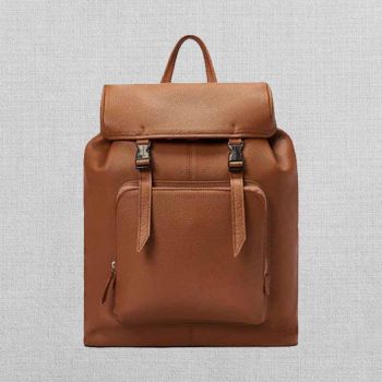 Tan leather backpack with buckle closure in American style
